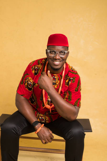Igbo Traditionally Dressed Business Man Sitting Down and Smiling